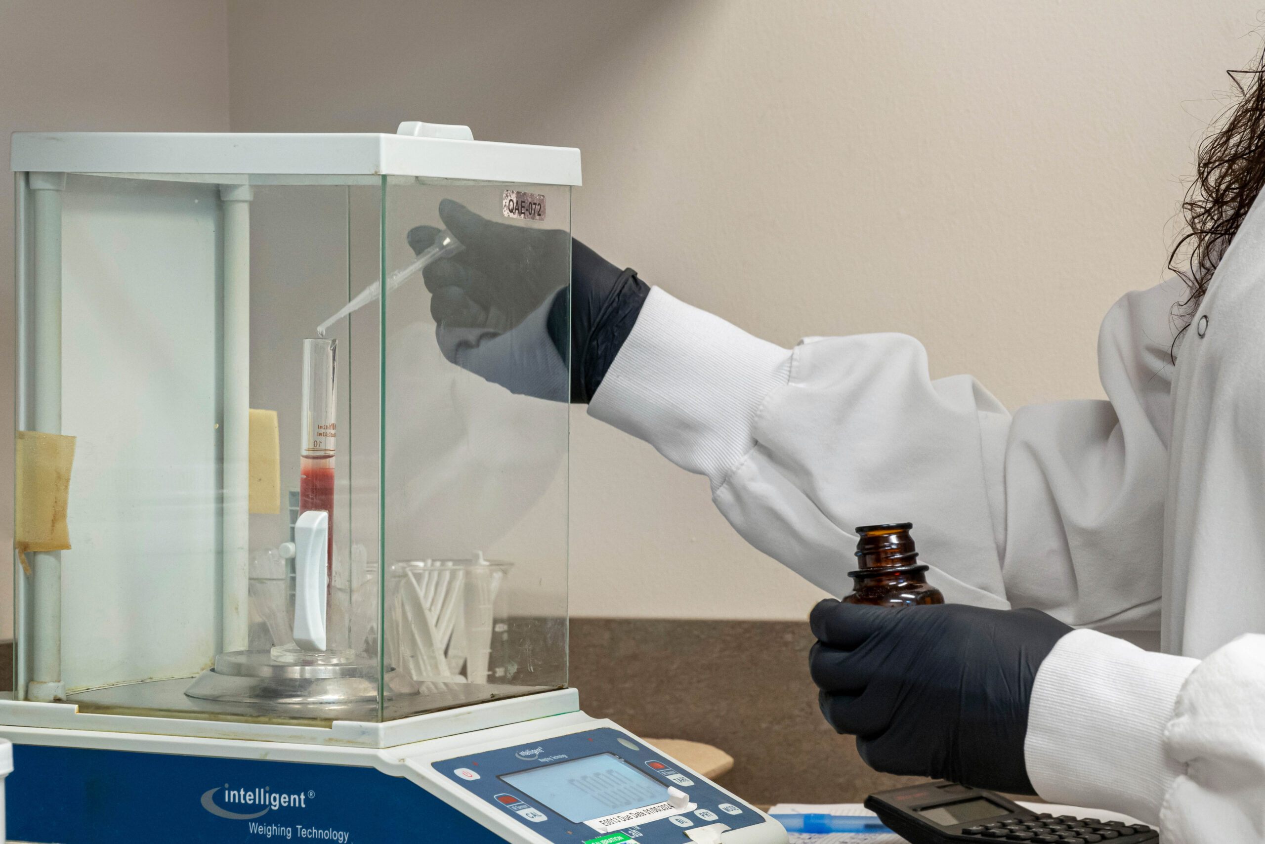 Image of a scientist formulating nutraceuticals in PEAK's lab